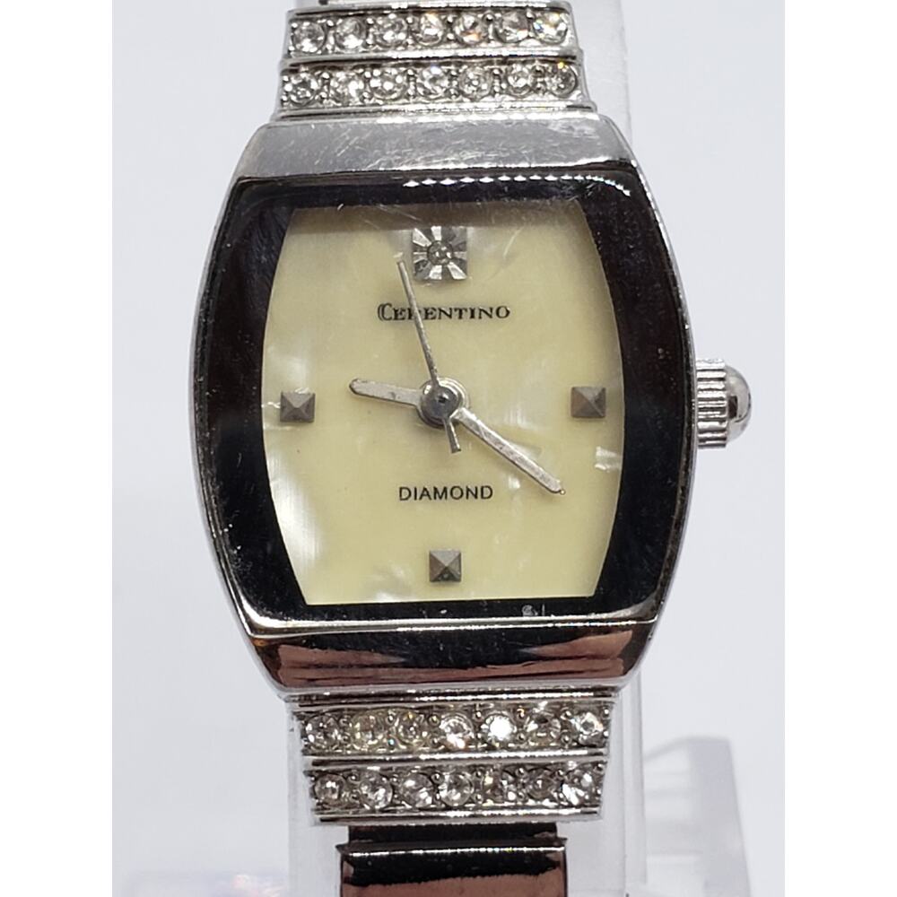 Cerentino women' watch. Cream opalescent face Jeweled clasp edges. Working watch